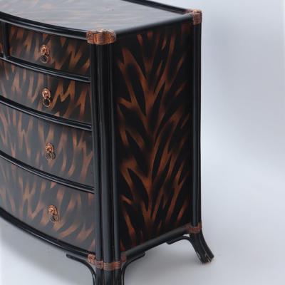 Maitland Smith A Maitland Smith ebonized five drawer bow front commode with flame decoration