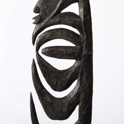 Male Yipwon Figural Carved Wood Sculpture on Stone Base