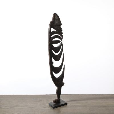 Male Yipwon Figural Carved Wood Sculpture on Stone Base