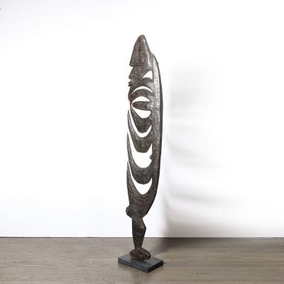 Male Yipwon Figural Carved Wood Sculpture on Stone Base