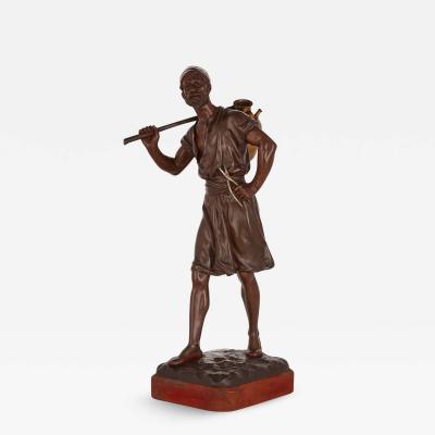 Marcel Debut Orientalist bronze figure of a water carrier by Marcel Debut