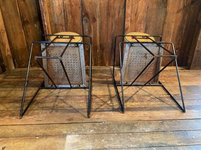 Mario Botta PAIR OF STAINLESS STEEL AND LEATHER ARMCHAIRS IN THE MANNER OF MARIO BOTTA