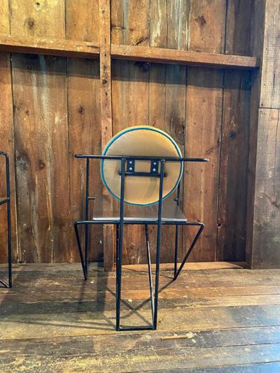 Mario Botta PAIR OF STAINLESS STEEL AND LEATHER ARMCHAIRS IN THE MANNER OF MARIO BOTTA