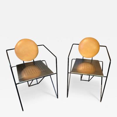 Mario Botta PAIR OF STAINLESS STEEL AND LEATHER ARMCHAIRS IN THE MANNER OF MARIO BOTTA