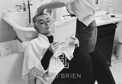 Mark Shaw Audrey Hepburn Getting Shampooed and Reading 1953