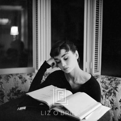 Mark Shaw Audrey Hepburn Supine Reading Sitting up 1953