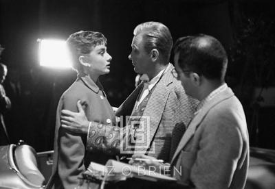 Mark Shaw Audrey Hepburn and William Holden on Set of Sabrina Hand on Arm 1953