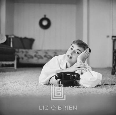 Mark Shaw Audrey Hepburn in White Blouse with Phone Head on Hand 1953