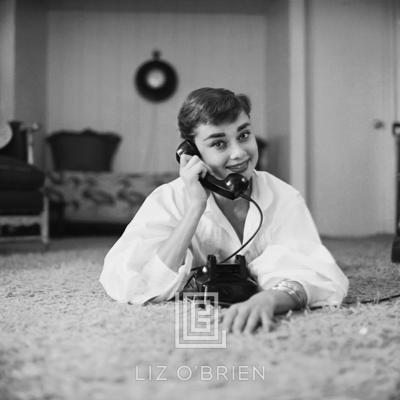Mark Shaw Audrey Hepburn in White Blouse with Phone Laying Hand on Receiver