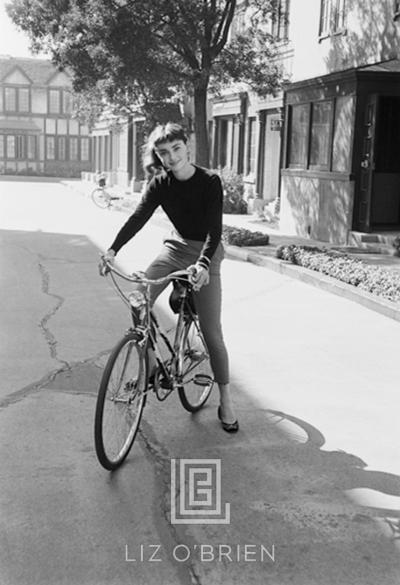 Mark Shaw Audrey Hepburn on Bicycle Smiling 1953