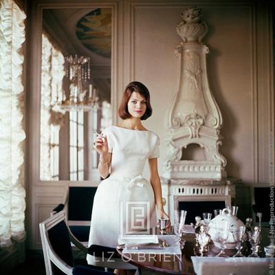Mark Shaw Designers Homes Model wears White Goma in Henry Samuels Home 1960