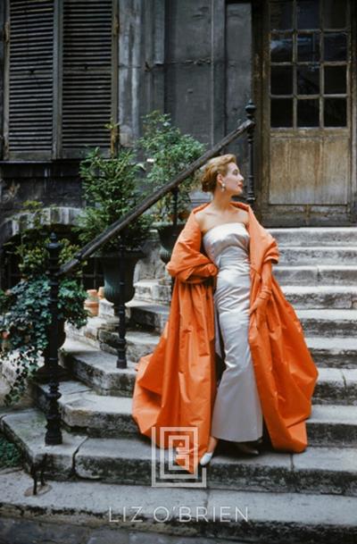 Mark Shaw Givenchy Rust Cape in Courtyard 1955