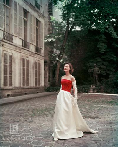 Mark Shaw Red and White Satin Balenciaga Gown in Paris Courtyard