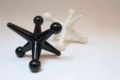 Marquis Collection of Beverly Hills Pair of Vintage Oversized Tessellated Stone Jax Jacks Sculptures or Bookends