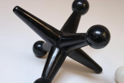 Marquis Collection of Beverly Hills Pair of Vintage Oversized Tessellated Stone Jax Jacks Sculptures or Bookends