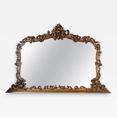 Massive Hand Carved Giltwood Mirror