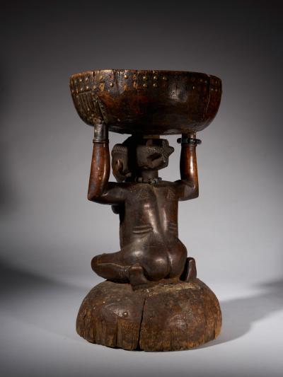 Massive and Robust Zela Caryatide Stool held by a Female sculpture