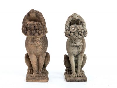 Matched Pair of Composite Stone Dogs with Fruit Baskets England Mid 20th C 