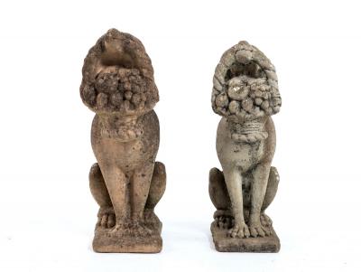 Matched Pair of Composite Stone Dogs with Fruit Baskets England Mid 20th C 