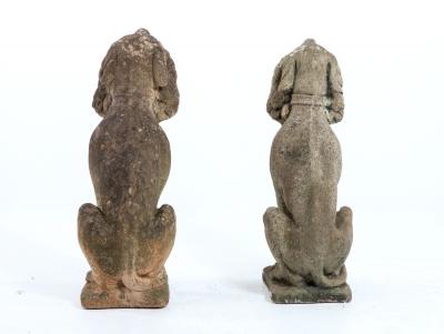 Matched Pair of Composite Stone Dogs with Fruit Baskets England Mid 20th C 