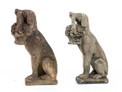 Matched Pair of Composite Stone Dogs with Fruit Baskets England Mid 20th C 