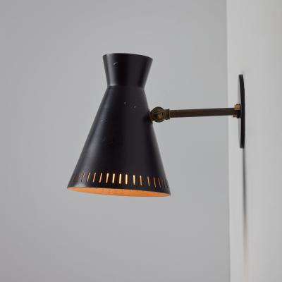 Mauri Almari 1950s Perforated Black Metal Diabolo Wall Lamp Attributed to Mauri Almari