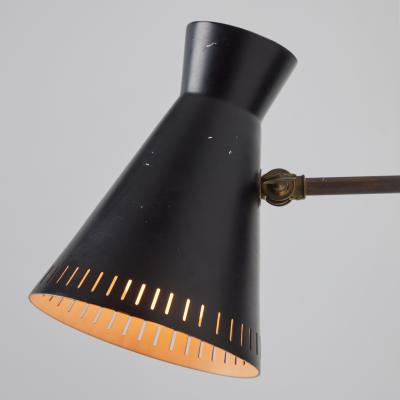 Mauri Almari 1950s Perforated Black Metal Diabolo Wall Lamp Attributed to Mauri Almari
