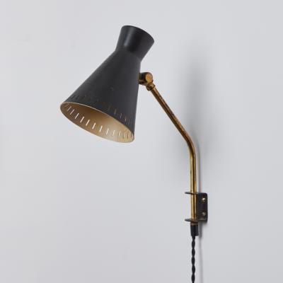 Mauri Almari 1950s Perforated Metal Diabolo Plug In Wall Lamp Attributed to Mauri Almari