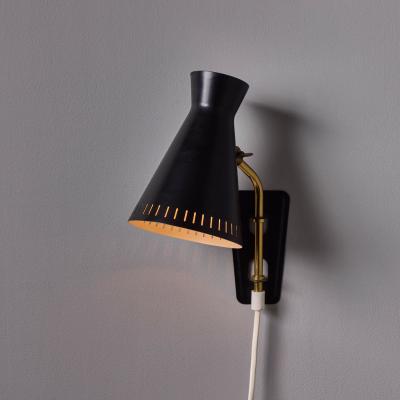 Mauri Almari 1950s Perforated Metal Diabolo Plug In Wall Lamp Attributed to Mauri Almari