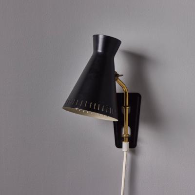 Mauri Almari 1950s Perforated Metal Diabolo Plug In Wall Lamp Attributed to Mauri Almari