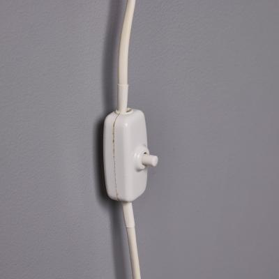 Mauri Almari 1950s Perforated Metal Diabolo Plug In Wall Lamp Attributed to Mauri Almari