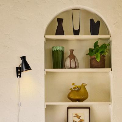 Mauri Almari 1950s Perforated Metal Diabolo Plug In Wall Lamp Attributed to Mauri Almari