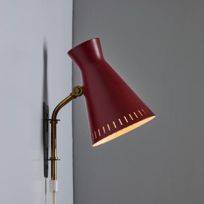 Mauri Almari 1950s Perforated Red Diabolo Plug In Wall Lamp Attributed to Mauri Almari