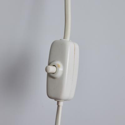 Mauri Almari 1950s Perforated Red Diabolo Plug In Wall Lamp Attributed to Mauri Almari