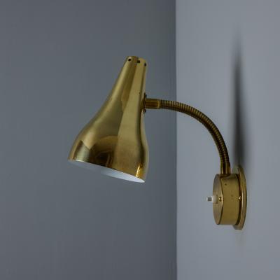 Mauri Almari Pair of 1950s Perforated Brass Wall Lamps Attributed to Mauri Almari