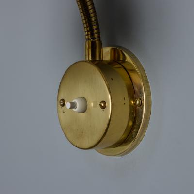 Mauri Almari Pair of 1950s Perforated Brass Wall Lamps Attributed to Mauri Almari