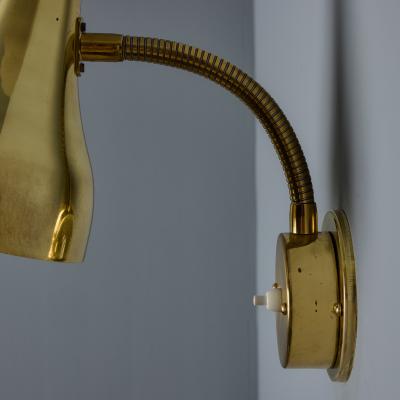 Mauri Almari Pair of 1950s Perforated Brass Wall Lamps Attributed to Mauri Almari