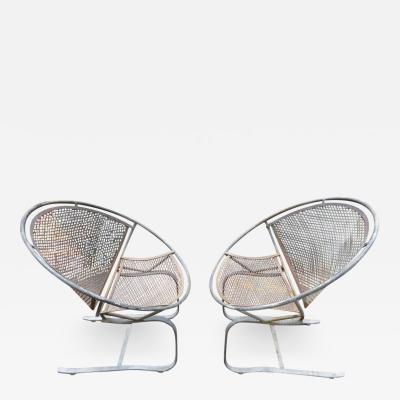 Maurizio Tempestini Lovely Pair of Maurizio Tempestini for Salterini Circular Radar Saucer Chairs