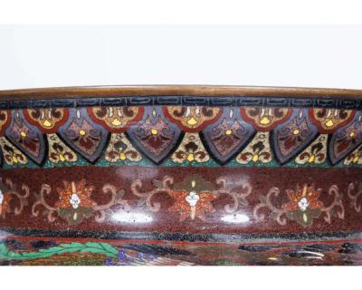 Meiji Masterpiece by Ando Jubei A Maroon Cloisonn Vase with Dragons Phoenix