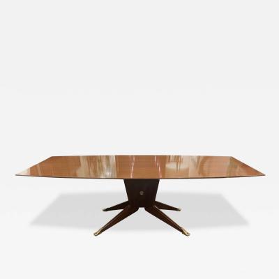 Melchiorre Bega A large cherrywood dining table by Melchiorre Bega