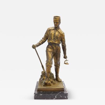 Metal Statuette On a Marble Base