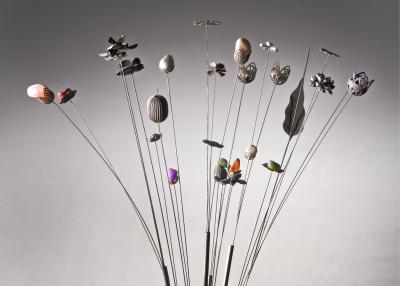 Metal vase with assorted set of hat pins Italy