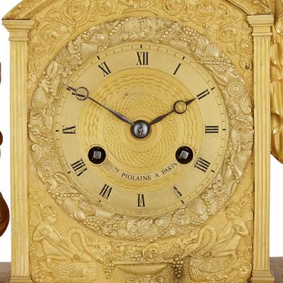 Michel Fran ois Piolaine Empire gilt bronze mantel clock by Michel Fran ois Piolaine