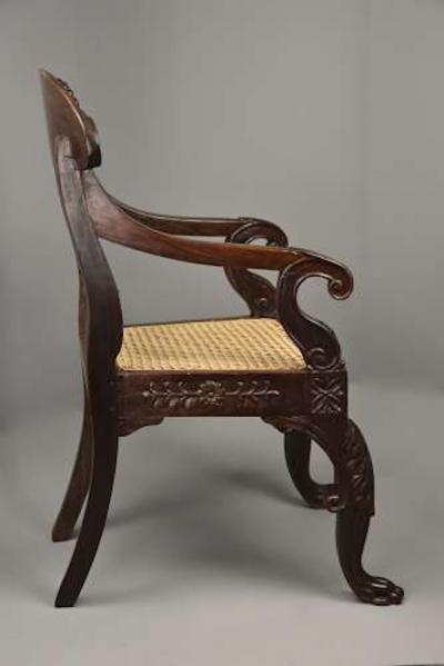 Mid 19th century Anglo Indian carved padouk open armchair