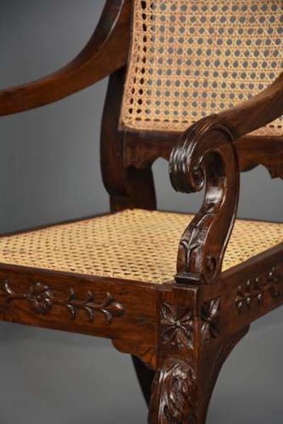 Mid 19th century Anglo Indian carved padouk open armchair
