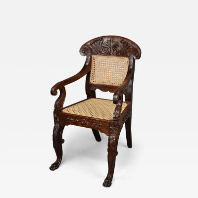 Mid 19th century Anglo Indian carved padouk open armchair