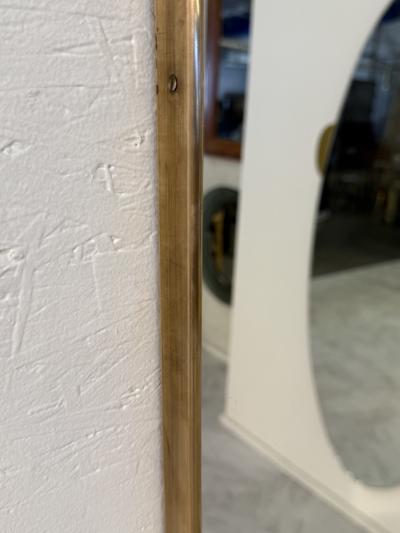 Mid Century Brass Framed Wall Mirror with Curved Silhouette 1960s