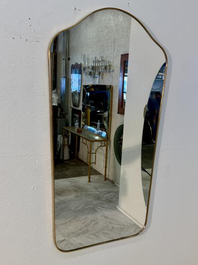 Mid Century Brass Framed Wall Mirror with Curved Silhouette 1960s