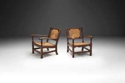 Mid Century Handcrafted Wood and Woven Straw Armchairs Europe ca 1950s