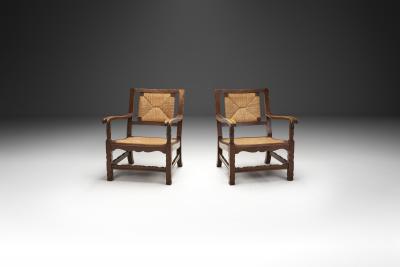 Mid Century Handcrafted Wood and Woven Straw Armchairs Europe ca 1950s